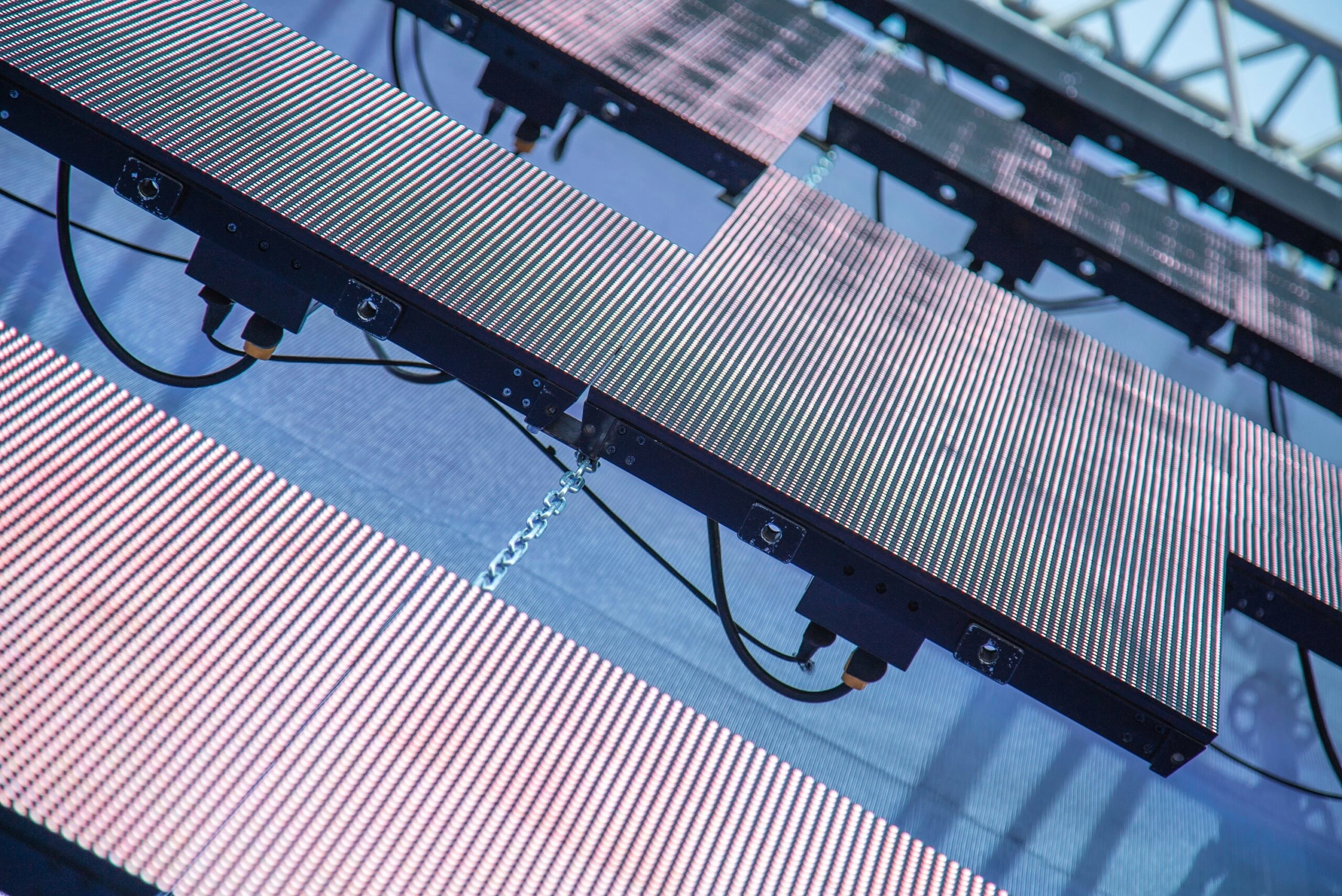 Close-up view of modular LED panels in an event setup, showcasing the intricate structure and wiring that enables vibrant, high-resolution displays.
