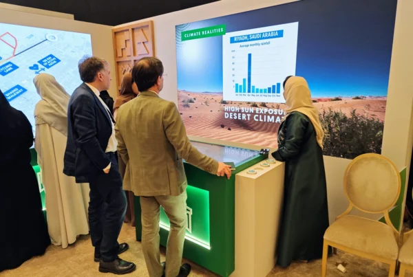 Large vertical screen with table object recognition demonstrating innovative urban development concepts in Riyadh.