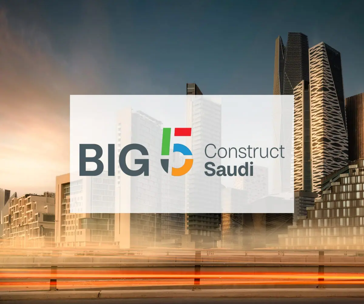 Big 5 Construct Saudi logo superimposed on a sunset view of Riyadh’s modern skyline, symbolising the kingdom’s construction boom.
