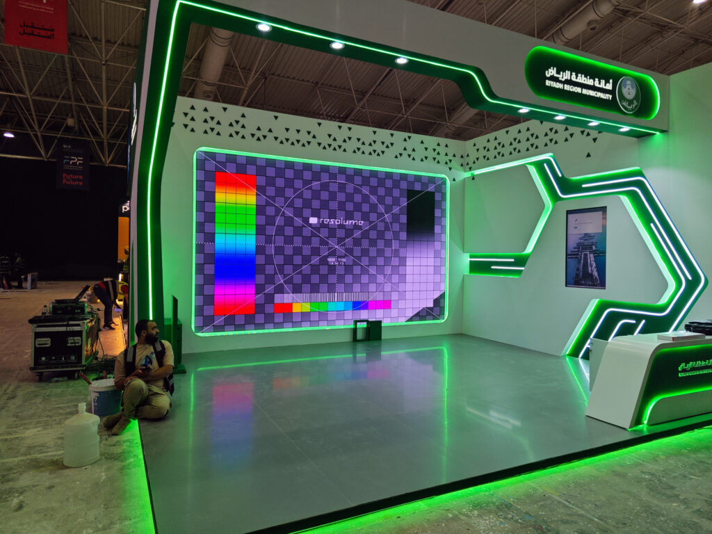 LED wall calibration at the Riyadh Region Municipality booth—test pattern displayed while installing the Riyadh Digital Twin at Future Projects Forum.