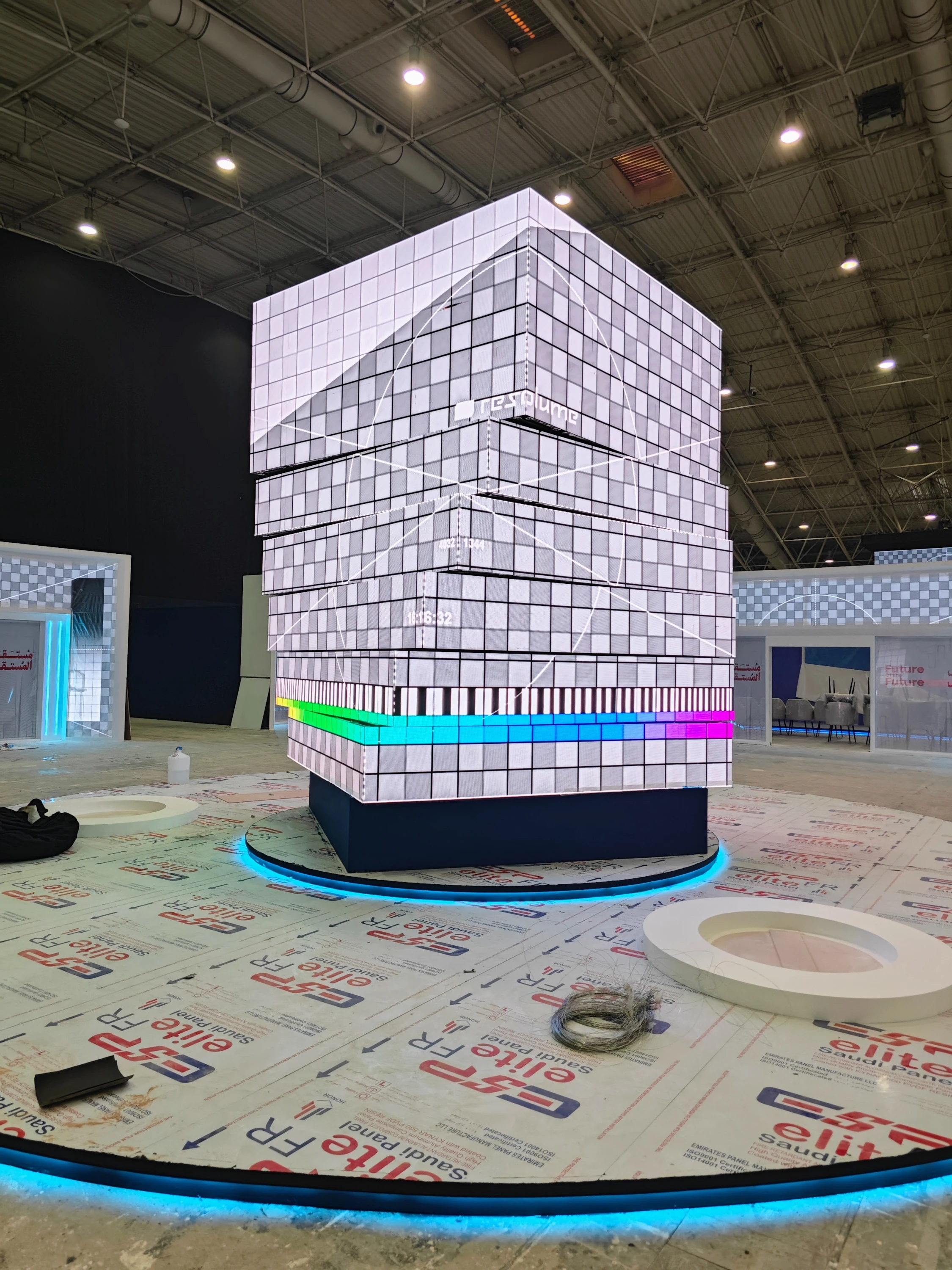 Multi-sided LED column showing geometry grid and color bars to verify signal mapping and color consistency during Riyadh Digital Twin setup at Future Projects Forum.